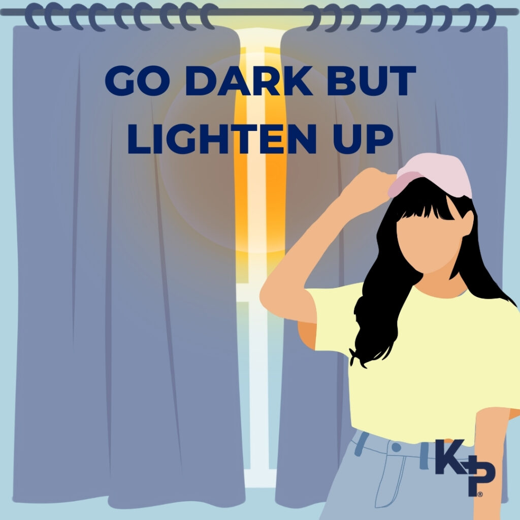 Blue curtains closed to block out the sun and an image of a woman dressed in lighter summer clothes, with a T shirt and cap and the wording go dark but lighten up.